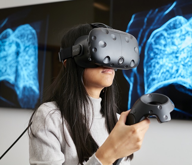 Female student using a VR headset