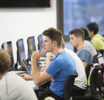 Students at looking at a PC screen