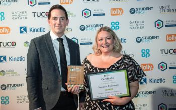 Sarah Clifford, Head of Commercial, accepting the award at the 2025 CUBO awards 