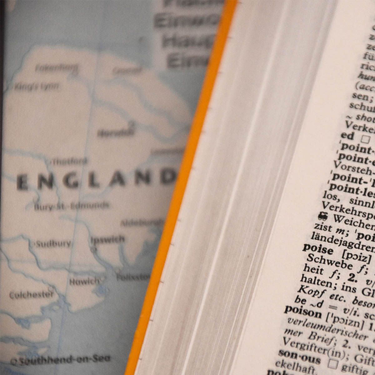 An open book and a map of England