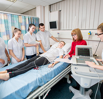 Students practicing a cardiogram