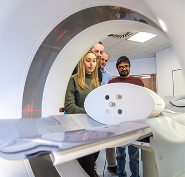 Students using a CT Scanner