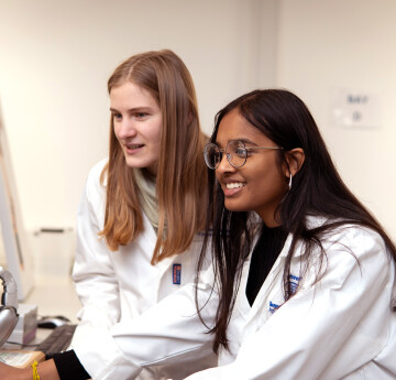 Two students in a lab