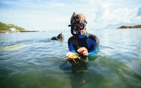 A student snorkeling. 
