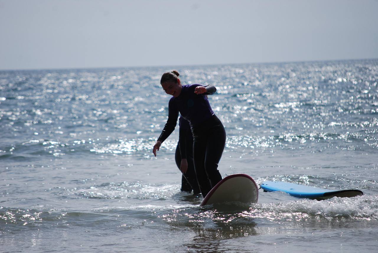 Student surfing in Swansea 