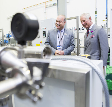 King Charles standing in Engineering lab