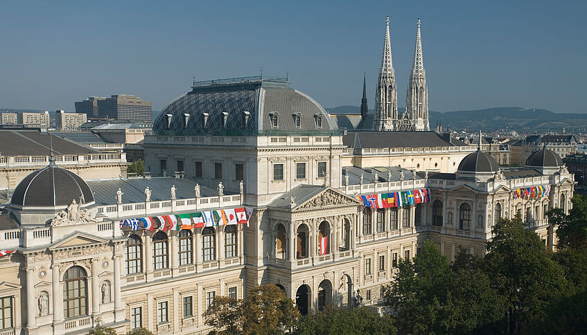 image of university building with flags