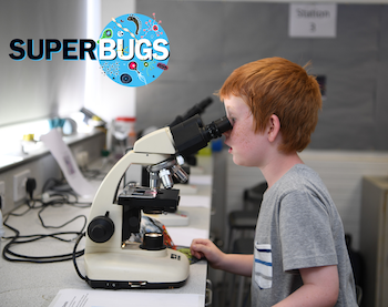 Child with a microscope