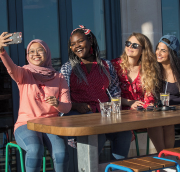 Students taking a selfie on Mumbles Pier