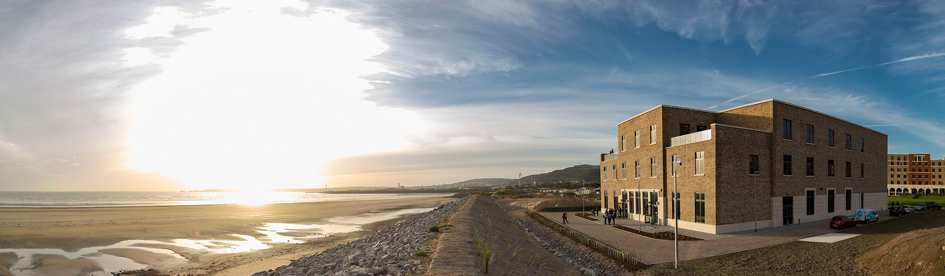 The College building on the edge of he Swansea University Bay Campus overlooking the beach.