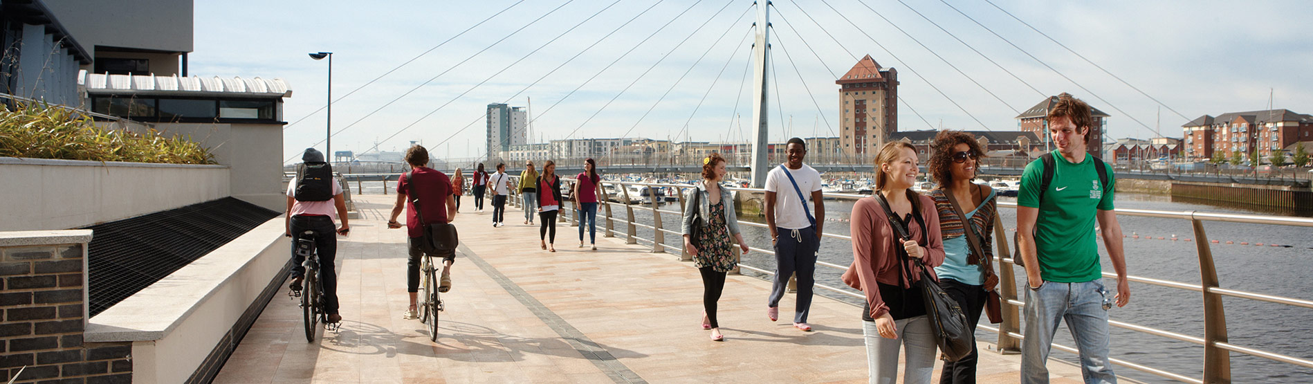 Students walking around the SA1 area of Swansea Marina.