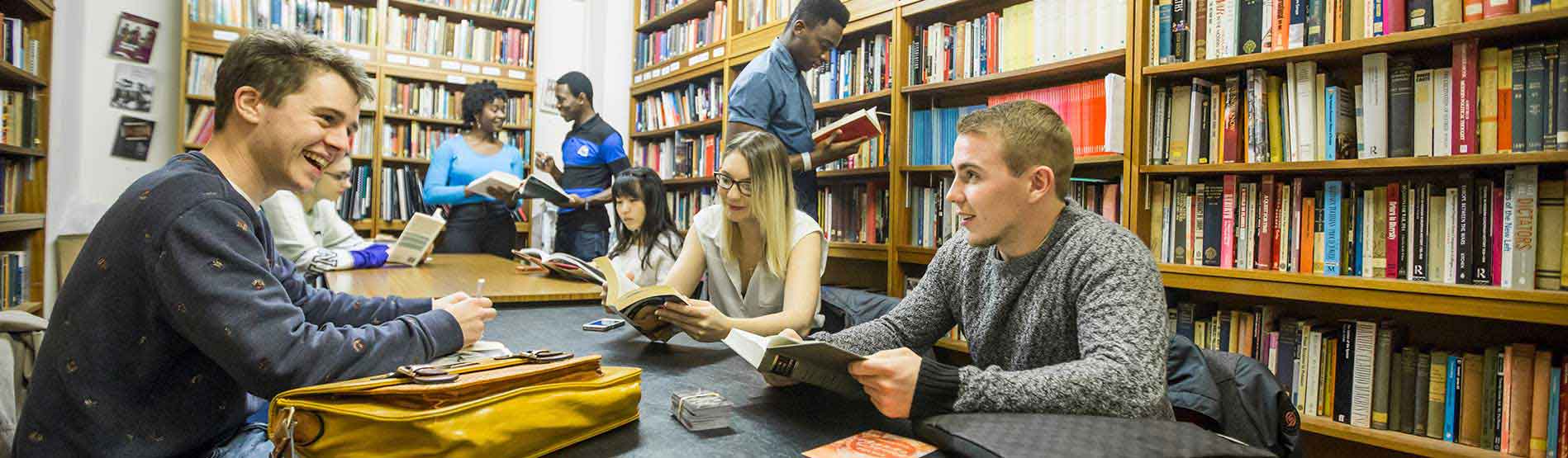 Photograph of students enjoying their studies in the library