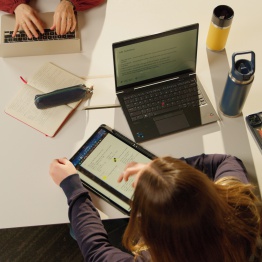 An image of students studying at a table in Taliesin Create on Singleton Campus. 