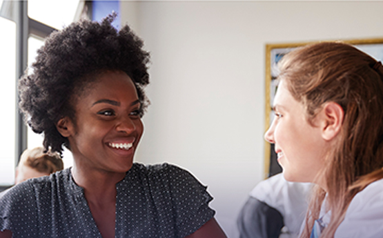 A teacher talking to a student