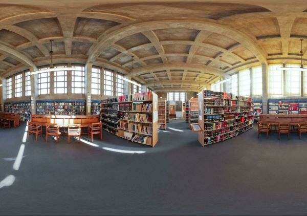 Panoramic law library with book stacks and study tables