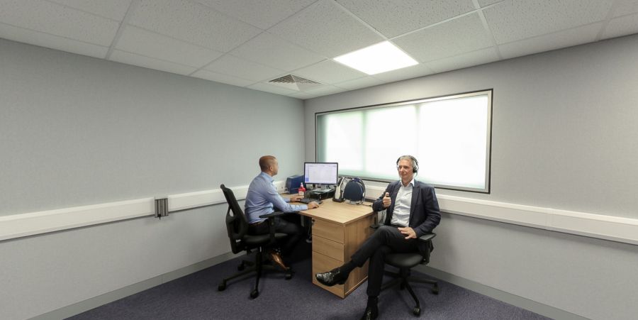 Audiology soundproof booth with hearing assessment equipment and computer 