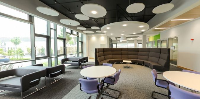 Data Science Building lounge with seating, tables and collaborative workspace 