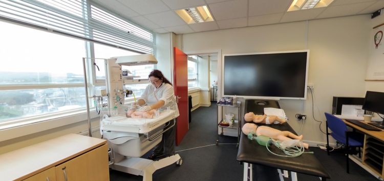 Midwifery practice suite with neonatal care equipment and training manikins